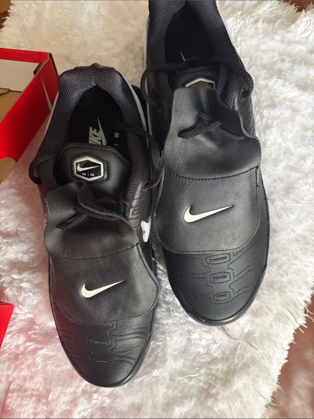 Nike women’s Black Athletic Slip-On Sneakers with White Swoosh